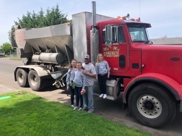 The Mini Mix Concrete family with their truck